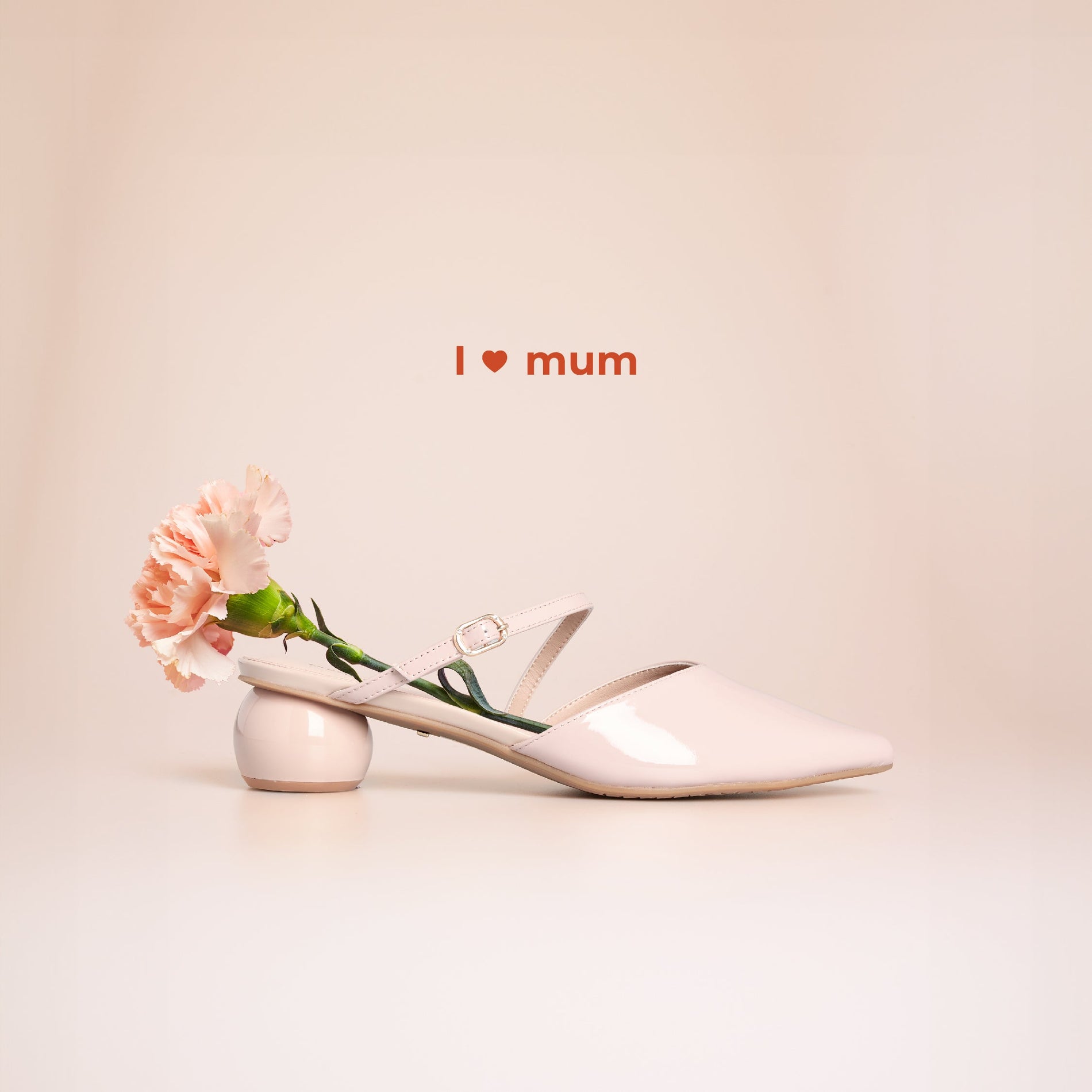prettyFIT Prudence Mules with a pink carnation — a sweet Mother’s Day tribute.